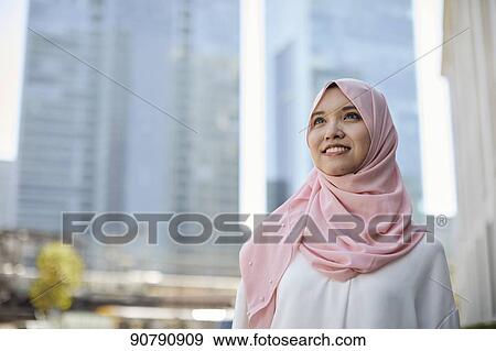 Young South-east Asian businesswoman View Large Photo Image Stock Photo - Young South-east Asian businesswoman. Fotosearch