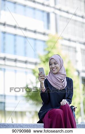 Stock Photo - Young South-east Asian businesswoman. Fotosearch