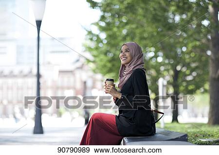 Young South-east Asian businesswoman View Large Photo Image Stock Photo - Young South-east Asian businesswoman. Fotosearch