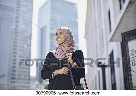 Young South-east Asian businesswoman View Large Photo Image Stock Photograph - Young South-east Asian businesswoman. Fotosearch