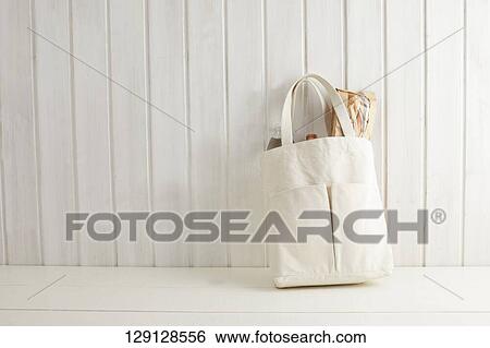 Stock Photograph - Baguette And Bottles In Tote Bag. Fotosearch