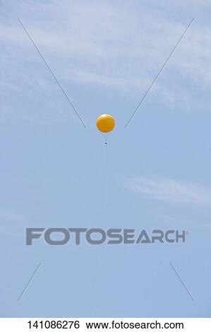 Stock Photograph - Balloon In The Sky. Fotosearch
