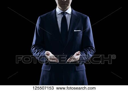 Businessman on black background View Large Photo Image Stock Image - Businessman on black background. Fotosearch