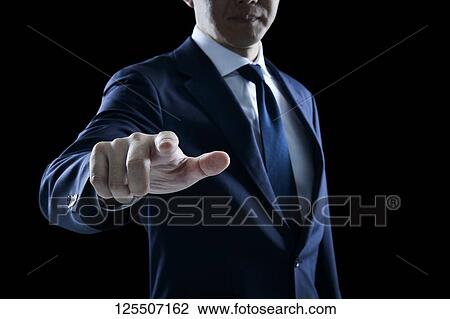 Businessman on black background View Large Photo Image Stock Image - Businessman on black background. Fotosearch