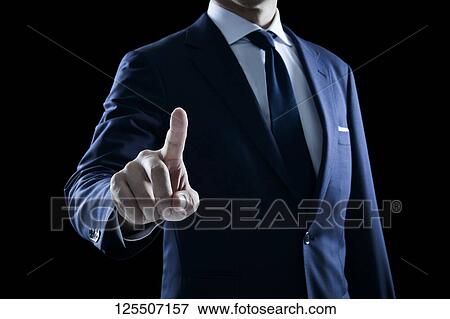 Businessman on black background View Large Photo Image Stock Photo - Businessman on black background. Fotosearch