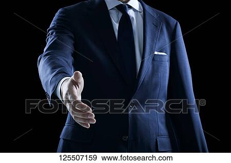 Businessman on black background View Large Photo Image Stock Photo - Businessman on black background. Fotosearch