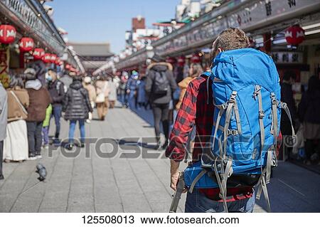 Caucasian man visiting Tokyo, Japan View Large Photo Image Stock Image - Caucasian man visiting Tokyo, Japan. Fotosearch