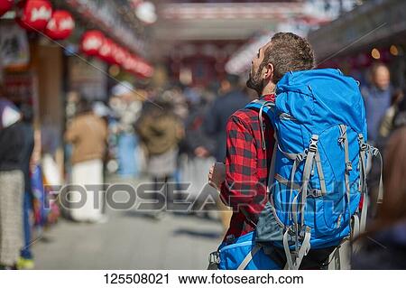 Caucasian man visiting Tokyo, Japan View Large Photo Image Stock Image - Caucasian man visiting Tokyo, Japan. Fotosearch