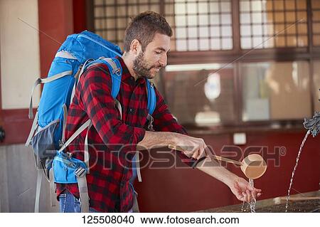 Caucasian man visiting Tokyo, Japan View Large Photo Image Stock Image - Caucasian man visiting Tokyo, Japan. Fotosearch