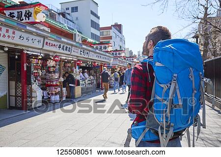 Caucasian man visiting Tokyo, Japan View Large Photo Image Stock Image - Caucasian man visiting Tokyo, Japan. Fotosearch
