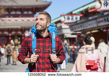 Caucasian man visiting Tokyo, Japan View Large Photo Image Stock Image - Caucasian man visiting Tokyo, Japan. Fotosearch