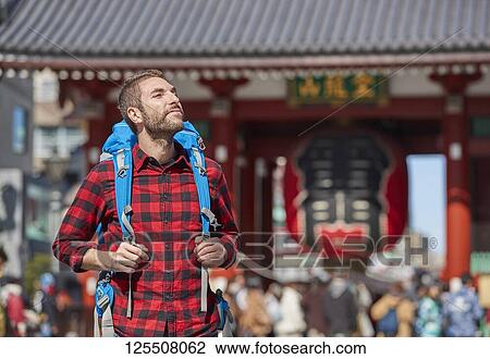 Caucasian man visiting Tokyo, Japan View Large Photo Image Stock Image - Caucasian man visiting Tokyo, Japan. Fotosearch