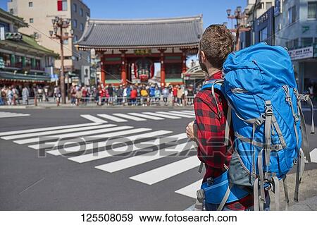 Caucasian man visiting Tokyo, Japan View Large Photo Image Stock Photo - Caucasian man visiting Tokyo, Japan. Fotosearch
