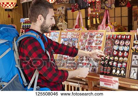 Stock Photograph - Caucasian man visiting Tokyo, Japan. Fotosearch
