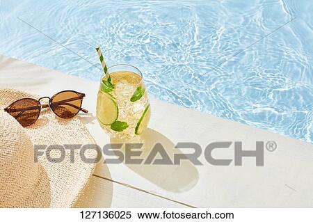 Stock Photography - Cocktails At The Poolside. Fotosearch