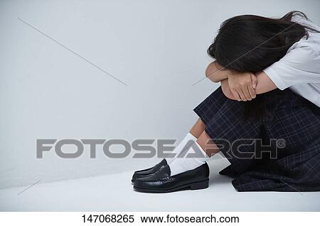 Depressed Japanese junior high schoolgirl View Large Photo Image Stock Photography - Depressed Japanese junior high schoolgirl. Fotosearch