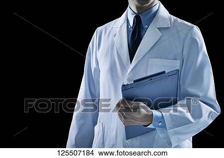 Doctor on black background View Large Photo Image Picture - Doctor on black background. Fotosearch