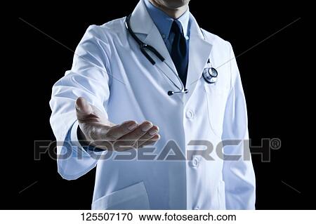 Doctor on black background View Large Photo Image Stock Image - Doctor on black background. Fotosearch
