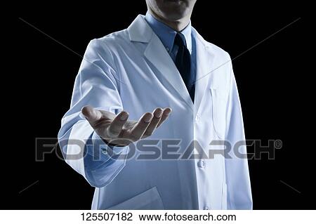 Doctor on black background View Large Photo Image Stock Image - Doctor on black background. Fotosearch