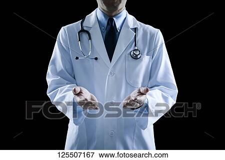 Stock Photo - Doctor on black background. Fotosearch