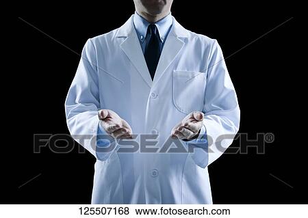 Stock Photo - Doctor on black background. Fotosearch
