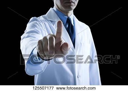 Stock Photo - Doctor on black background. Fotosearch