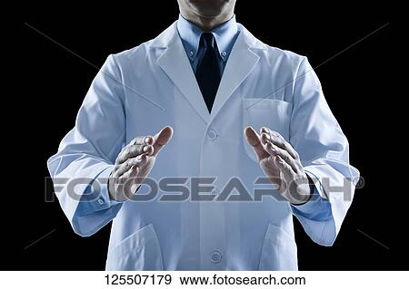 Doctor on black background View Large Photo Image Stock Photo - Doctor on black background. Fotosearch