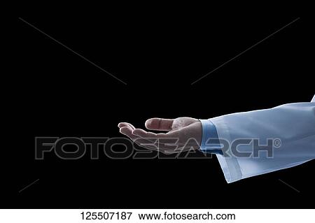 Doctor on black background View Large Photo Image Stock Photo - Doctor on black background. Fotosearch