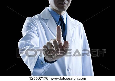 Doctor on black background View Large Photo Image Stock Photograph - Doctor on black background. Fotosearch
