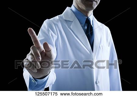 Stock Photography - Doctor on black background. Fotosearch