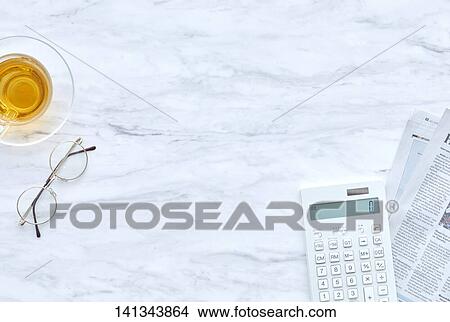 Electronic Calculator And Glasses On The Desk View Large Photo Image Picture - Electronic Calculator And Glasses On The Desk. Fotosearch