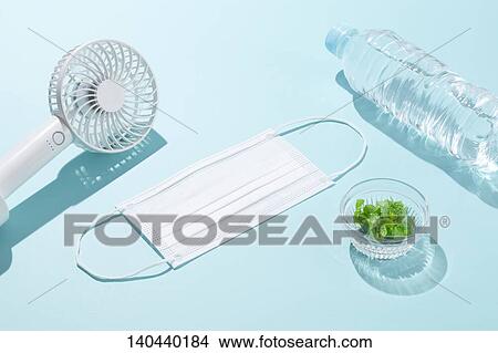 Face Mask And Handy Fan View Large Photo Image Picture - Face Mask And Handy Fan. Fotosearch
