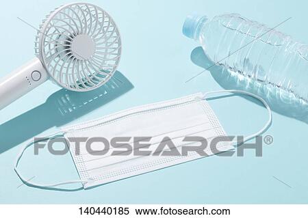Face Mask And Handy Fan View Large Photo Image Stock Photography - Face Mask And Handy Fan. Fotosearch