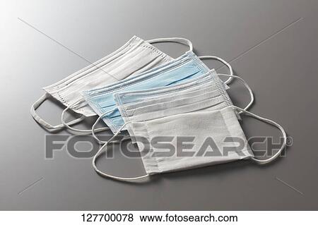 Stock Photo - Face Masks. Fotosearch