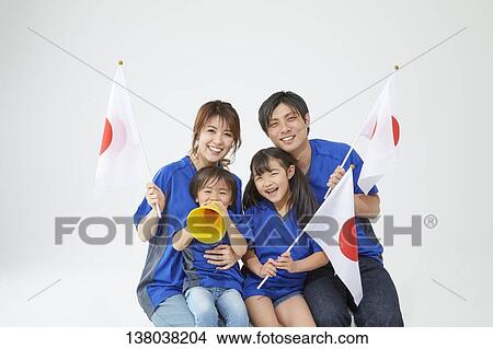 Family Watching A Game And Cheering View Large Photo Image Picture - Family Watching A Game And Cheering. Fotosearch