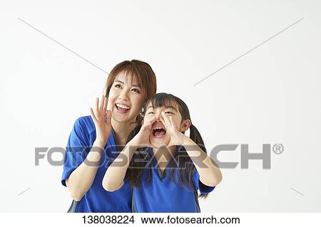 Picture - Family Watching A Game And Cheering. Fotosearch