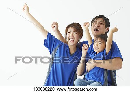 Family Watching A Game And Cheering View Large Photo Image Stock Image - Family Watching A Game And Cheering. Fotosearch