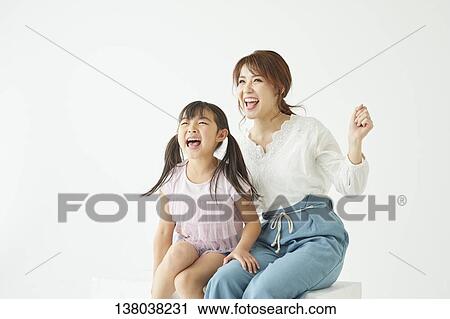Family Watching A Game And Cheering View Large Photo Image Stock Image - Family Watching A Game And Cheering. Fotosearch