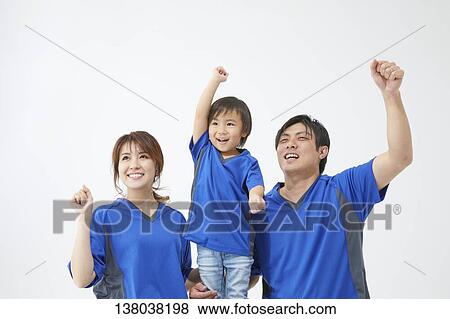 Family Watching A Game And Cheering View Large Photo Image Stock Photo - Family Watching A Game And Cheering. Fotosearch