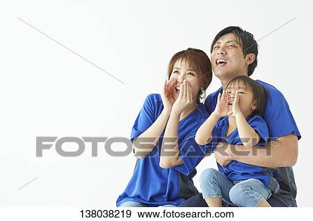 Family Watching A Game And Cheering View Large Photo Image Stock Photo - Family Watching A Game And Cheering. Fotosearch