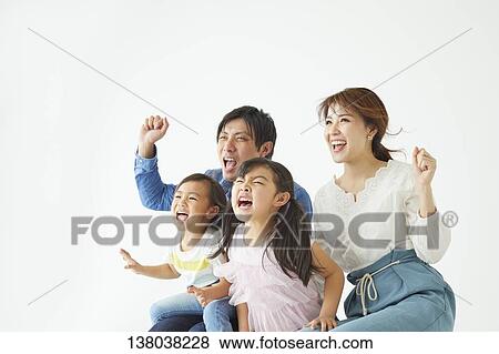 Family Watching A Game And Cheering View Large Photo Image Stock Photo - Family Watching A Game And Cheering. Fotosearch