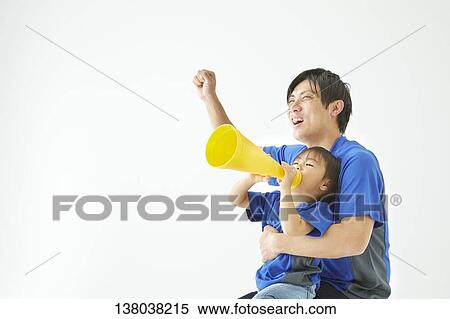 Family Watching A Game And Cheering View Large Photo Image Stock Photography - Family Watching A Game And Cheering. Fotosearch