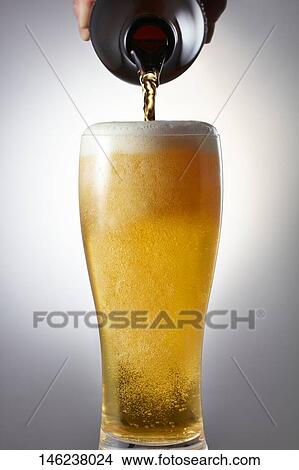 Glass of beer View Large Photo Image Picture - Glass of beer. Fotosearch