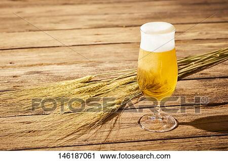 Stock Image - Glass of beer. Fotosearch