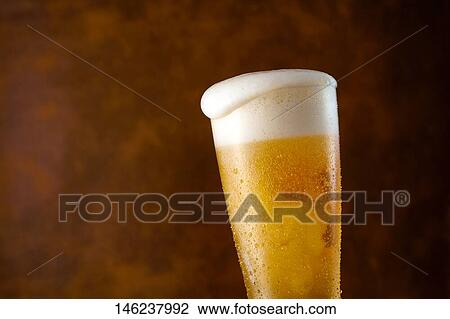 Glass of beer View Large Photo Image Stock Image - Glass of beer. Fotosearch