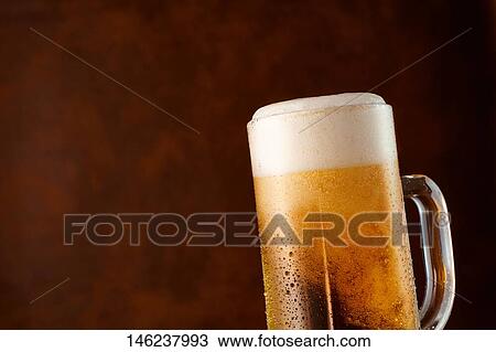 Glass of beer View Large Photo Image Stock Image - Glass of beer. Fotosearch