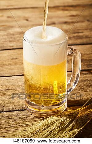Glass of beer View Large Photo Image Stock Photo - Glass of beer. Fotosearch