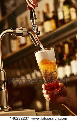Glass of beer View Large Photo Image Stock Photo - Glass of beer. Fotosearch