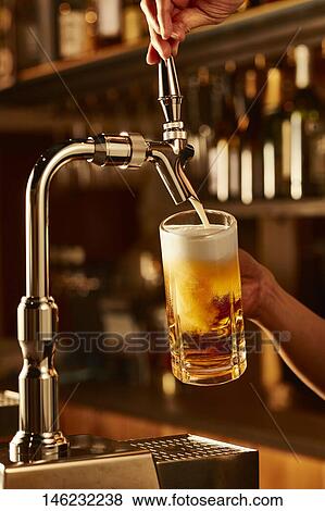 Glass of beer View Large Photo Image Stock Photo - Glass of beer. Fotosearch