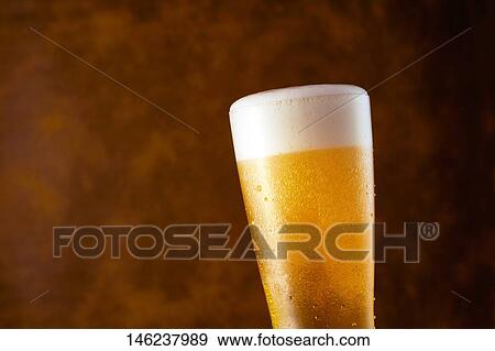 Glass of beer View Large Photo Image Stock Photo - Glass of beer. Fotosearch